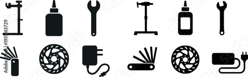 A variety of repair tools and supplies are organized neatly. Items include a stand, glue bottle, wrench, measuring tool, brake disc, and charger. Ideal for maintenance tasks.