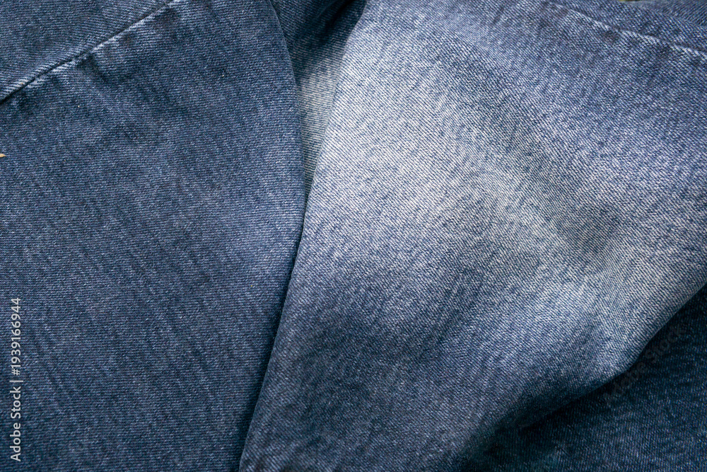 Fototapeta premium Blue denim jeans fabric texture