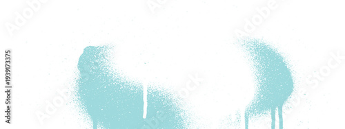Light blue spray paint drips and splatters on white background