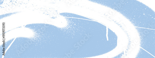 Light blue abstract artistic brush strokes with spray texture