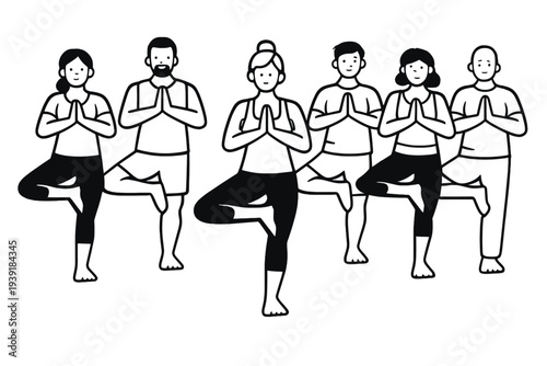 Group of people practicing yoga in a studio during a wellness class in