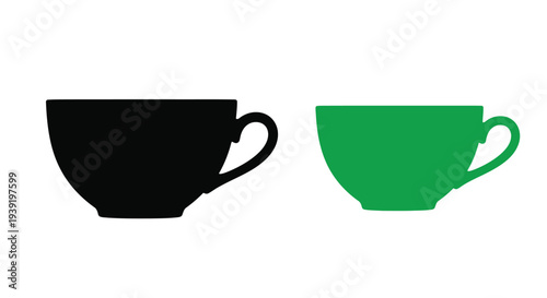 Two teacups one black and one green are displayed side by side