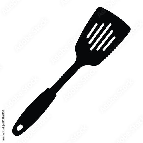Black silhouette of a slotted kitchen spatula kitchen utensil