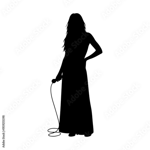 Silhouette of a Woman Holding a Microphone on Stage.