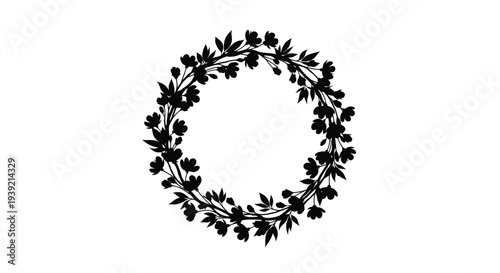 Floral wreath design featuring a circular arrangement black silhouette