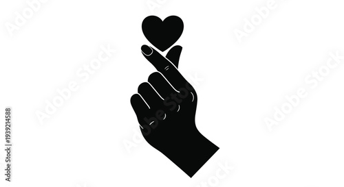 A black hand making a heart shape with fingers silhouette