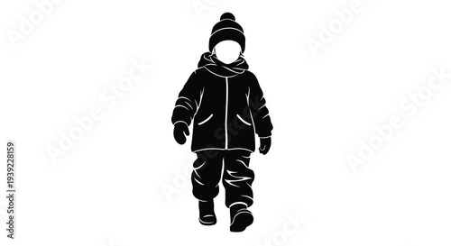 A young child warmly dressed for winter depicted as a silhouette