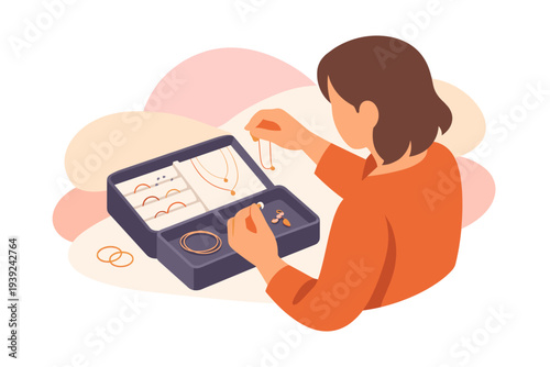 Woman choosing jewelry from a storage box.