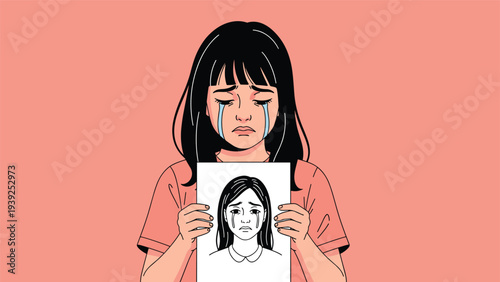 A crying girl holds a drawing of herself crying, symbolizing sadness, emotional pain, mental health, and artistic expression of feelings.