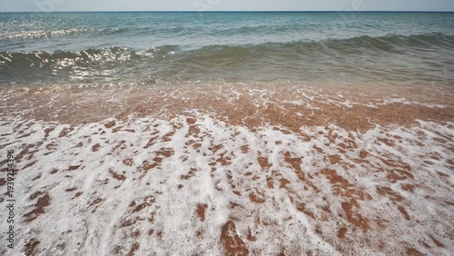 Konstfotografi Soft waves lapping sandy crimean shoreline, revealing peaceful maritime landscap