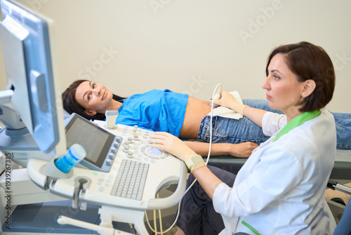 Calm patient undergoing ultrasound in medical room