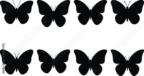 Collection of eight black butterfly silhouettes isolated on a white background, showcasing diverse wing shapes and sizes for design elements.