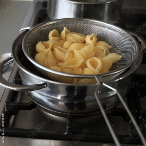cooking pasta in a pan