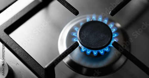 Gas burning in the burner of gas cooking surface
