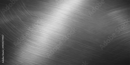 High-resolution brushed metal texture featuring a polished stainless steel plate with a shiny silver aluminum surface and a grey industrial pattern reflecting light across the textured chrome sheet