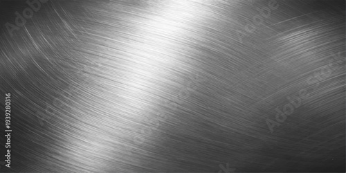 A polished silver stainless steel plate with a brushed metal texture creates a smooth metallic grey surface pattern suitable for a shiny industrial material background or aluminum wallpaper