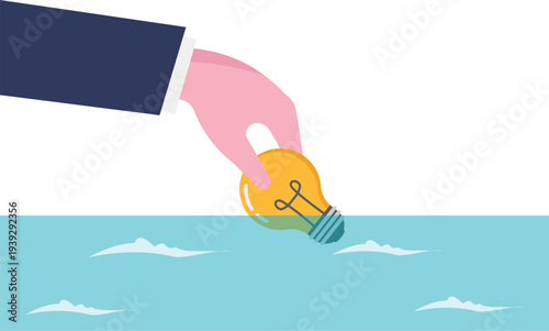 Hand Dropping Creative Idea into Ocean