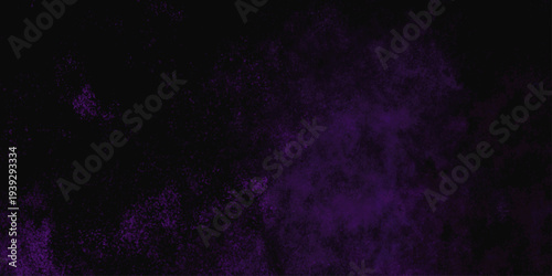 Freeze motion explosion of purple powder dust on a black background. abstract background with a textured gradient effect, suitable for wallpapers or graphic designs. Purple Smoke Cloudscape Texture.