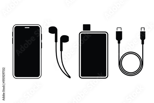 Black smartphone and power bank with earphones and cables