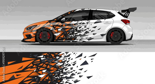 Dynamic orange and black race car with geometric wrap in motion.
