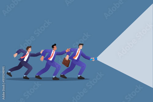 Visionary leader leading professional team with light in darkness. Concept of guidance, management, and strategic planning. Successful businessmen following the path to future corporate goals.