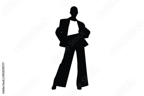 Silhouette of a person in a suit with arms crossed