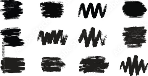 Collection of black brush strokes and marks on white background