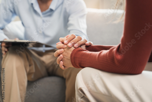 Bild auf Leinwand mental health issues concept, doctor touching patient hand showing empathy during depression therapy session