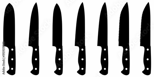A collection of various black silhouette kitchen knives displayed in a row