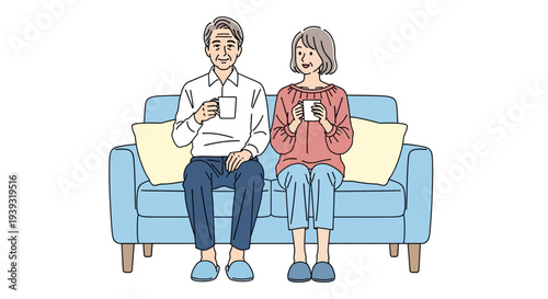 Elderly couple sitting on sofa holding coffee cups in living room