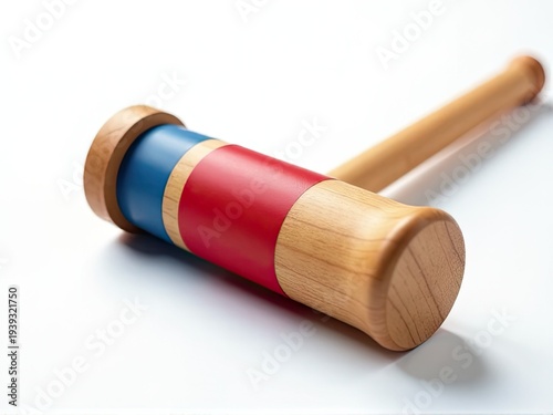 Two wooden baseball bats sit on a clean white surface, ready for use