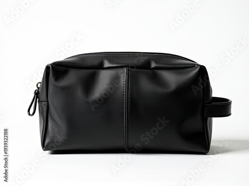 A black toilet bag sits on a white surface, ready for use