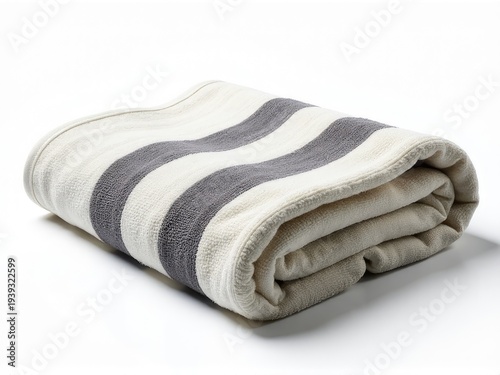 A blanket folded neatly on a white surface