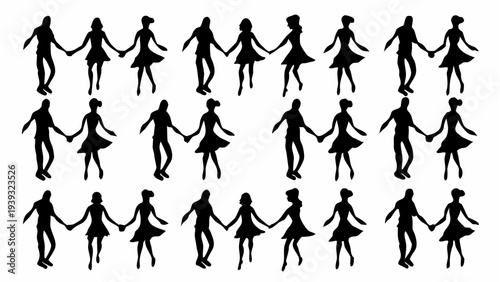 Silhouettes of happy couples dancing together in joyful celebration