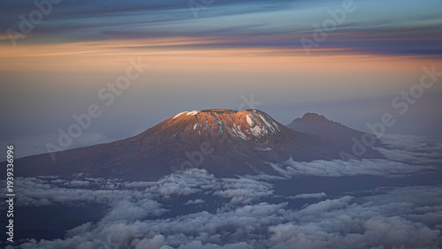 Canvas-taulu Mount Kilimanjaro seen from the air with dramatic light over the landscape