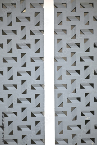 Modern geometric patterned wall with triangular cutouts