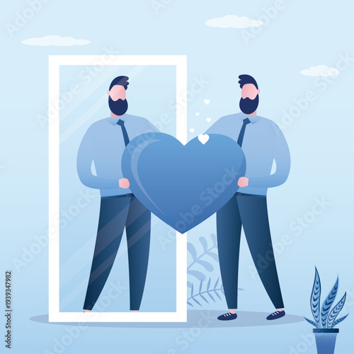 Happy man looks at his reflection in mirror, expressing self love and care. Love yourself. Love your body. Positive thinking. Body positive concept. Confident businessman