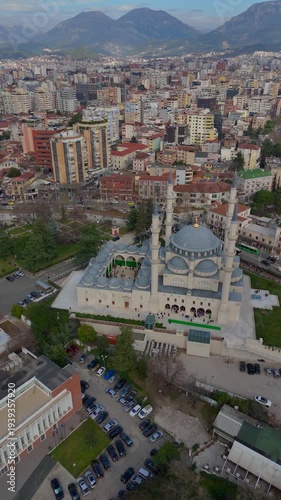 Vertical footage of an aerial drone view of buildings downtown Tirana, Albania