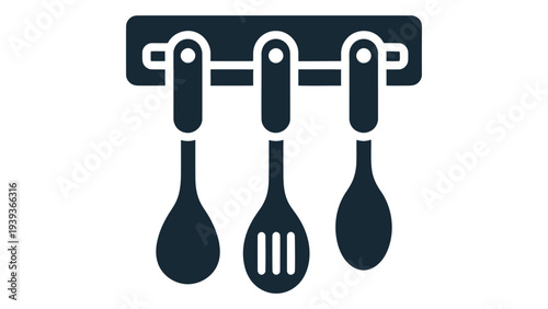 Wall mounted spoon holder with utensils for kitchen organization on the wall