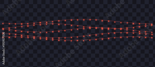 Three wavy strings of vibrant orange red glowing holiday lights illuminate a festive