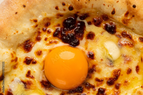 Slika na platnu Golden yolk nestled in bubbling khachapuri, invoking Georgian Feast Day, cheesy