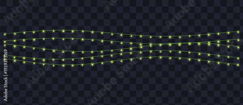 Wavy strands of luminous yellow green lights sparkle brightly on a dark