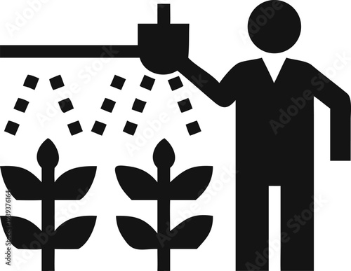 Person spraying two plants with a handheld device for garden care