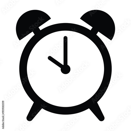 Classic analog alarm clock displays time with bold black hands and bells