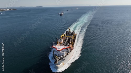 A giant ship is passing through Istanbul; aerial footage. Drone footage of the ship in the Istanbul Strait.