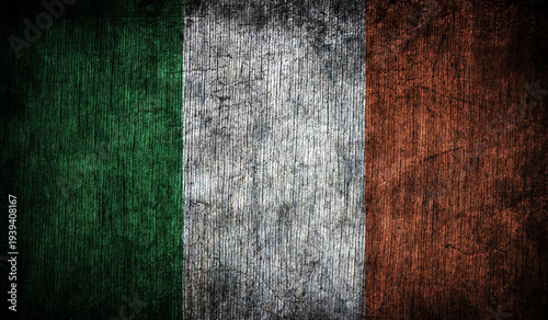 Abstract retro flag of Ireland on a wooden background.