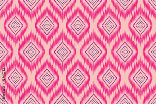 Seamless pink and purple Ikat fabric pattern featuring repeating diamond shapes with blurred dye edges, characteristic of traditional Ikat weaving. Ethnic and bohemian style textile design.