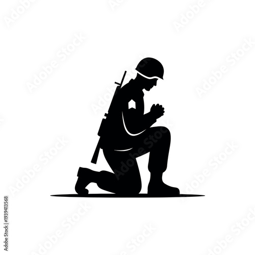 Silhouette of a soldier kneeling in prayer.