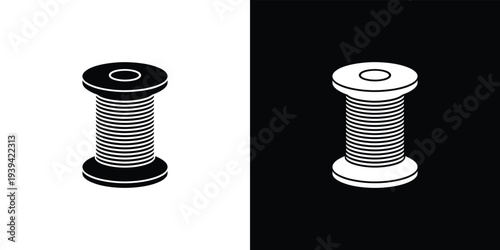 Black and white spool of thread on split background symbol