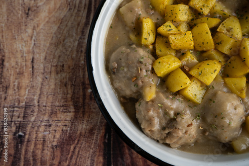 Comfort food meatballs with gravy and potatoes